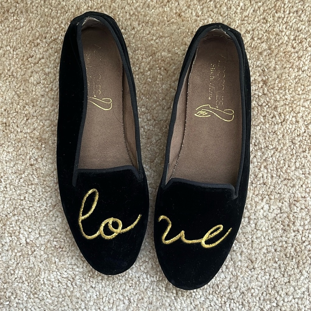 Black velvet and gold “Love” loafers from Aerosoles